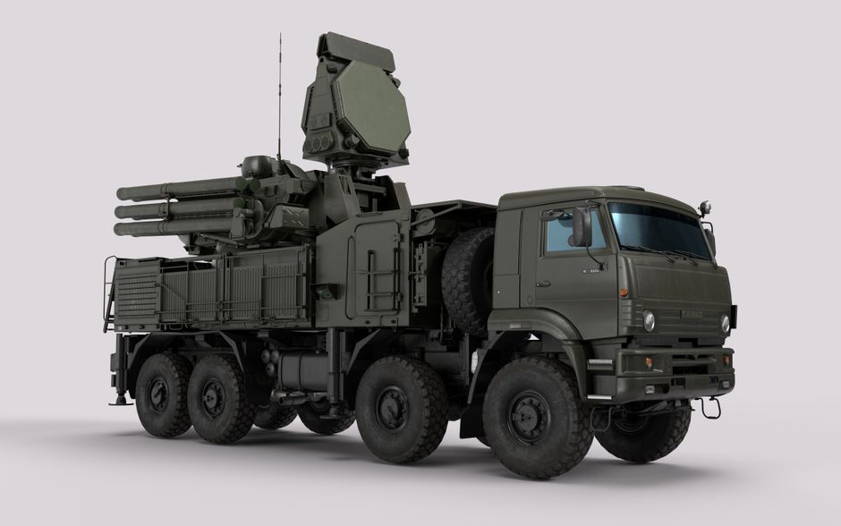 Detailed image of a military vehicle equipped with advanced radar and weaponry systems.