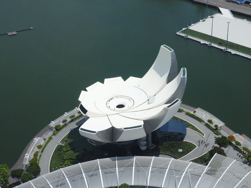 Aerial shot of the iconic ArtScience Museum beside Marina Bay in Singapore.