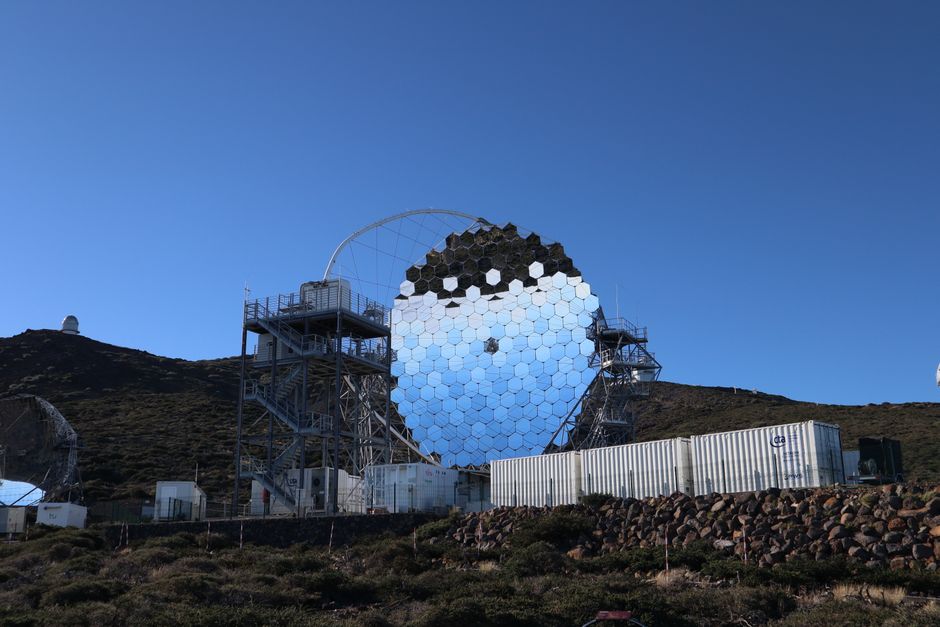 Modern telescope in La Palma set against a clear blue sky, a prime travel destination for stargazing.