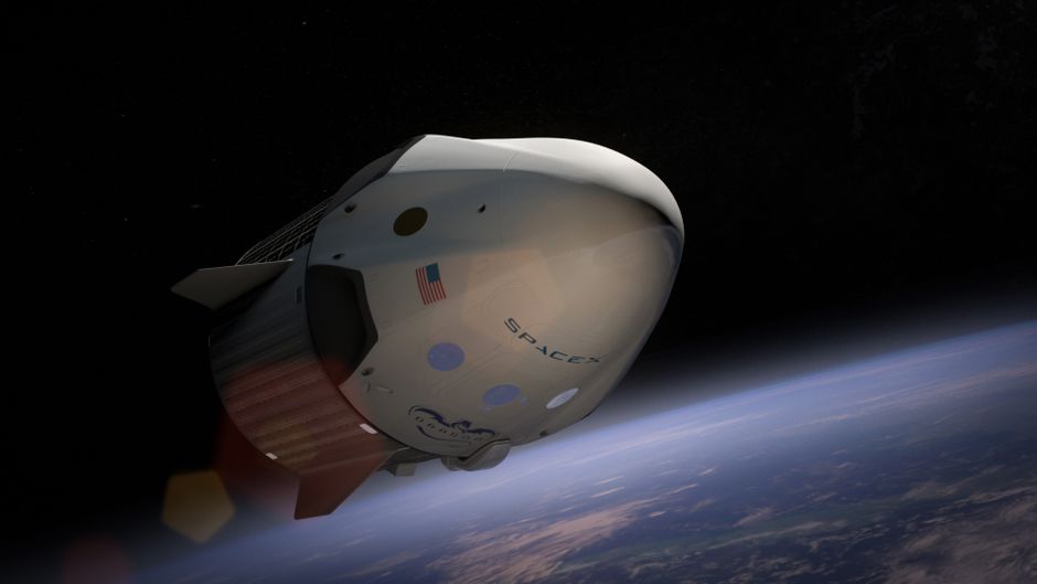 Un vaisseau spatial Dragon de SpaceX en orbite autour de la Terre.