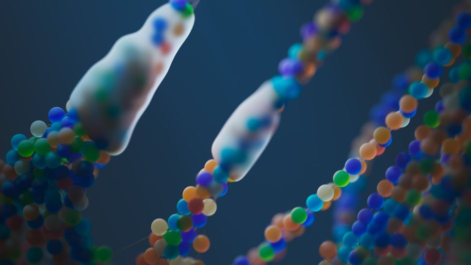 Représentation abstraite colorée de brins d'ADN en gros plan